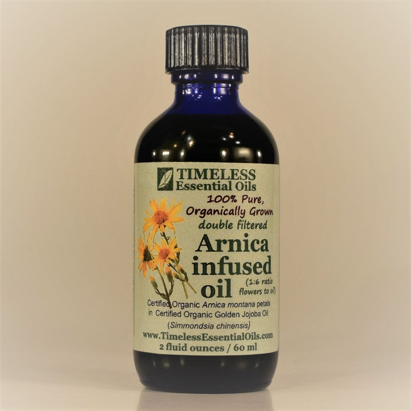 TIMELESS Premium, double filtered Arnica Infused Oil handcrafted in small batches with Certified Organic Arnica montana flowers and Certified Organic Golden Jojoba Oil.